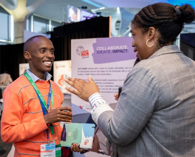 Clinician supporting a child